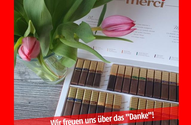 Eine Pralinenschachtel mit der Aufschrift: Wir freuen uns über das Danke!