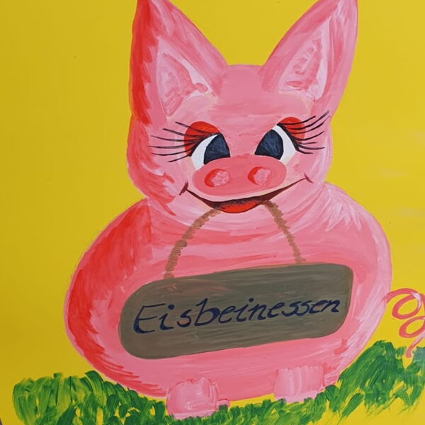 Ein gemaltes Schein mit einem Schild auf dem steht: "Eisbeinessen"