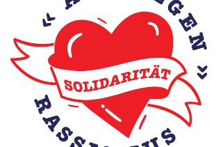 AWO GEGEN RASSISMUS - SOLILDATITÄT | Bild ein rotes Herz mit einer weißen Schärpe auf der Solidarität steht.